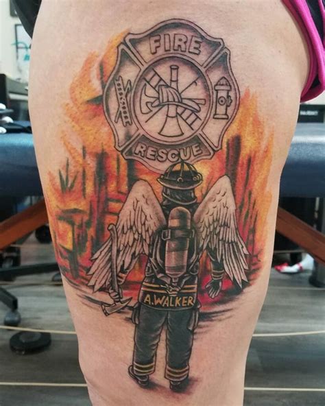 fireman tattoo ideas|firefighter helmet tattoos with angels.